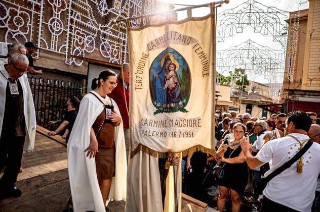 Solemn Procession of Our Lady of Mount Carmel in Palermo PALERMO, ITALY - JULY 26: Solemn Procession of the Silver Statue of the Our Lady of Mount Carmel from the Church of Carmine Maggiore, through the Old Ballaro Market and through the streets of the city, organised by the Venerable Confraternity of Our Lady of Mount Carmel, founded in 1735 on July 26, 2026 in Palermo, Italy. Palermo Sicily Italy Copyright: xStefanoxMontesix
