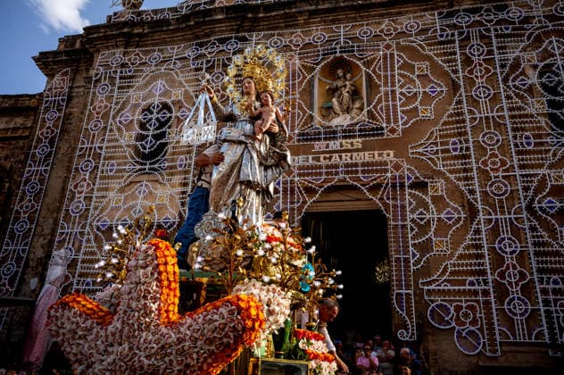 Solemn Procession of Our Lady of Mount Carmel in Palermo PALERMO, ITALY - JULY 26: Solemn Procession of the Silver Statue of the Our Lady of Mount Carmel from the Church of Carmine Maggiore, through the Old Ballaro Market and through the streets of the city, organised by the Venerable Confraternity of Our Lady of Mount Carmel, founded in 1735 on July 26, 2026 in Palermo, Italy. Palermo Sicily Italy Copyright: xStefanoxMontesix