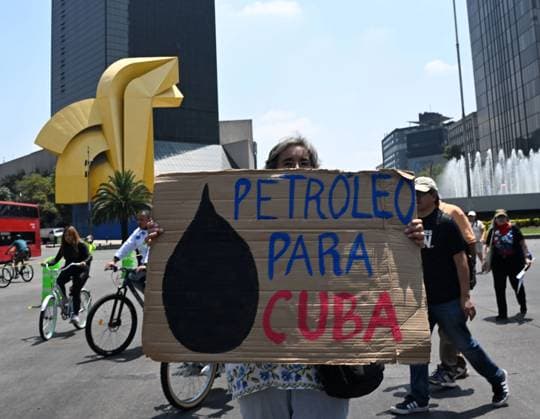 (260726) -- MEXICO CITY, July 26, 2026 -- Protesters march during a demonstration in support of Cuba and against U.S. embargo on Cuba, in Mexico City, Mexico on July 26, 2026. The demonstration aimed to commemorate the 73rd anniversary of the assault on Moncada and Carlos Manuel de Cespedes garrisons that took place on July 26, 1953, seen as the beginning of the Cuban Revolution. ) MEXICO-MEXICO CITY-SUPPORT CUBA WuxWei 