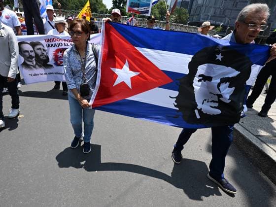 (260726) -- MEXICO CITY, July 26, 2026 -- Protesters march during a demonstration in support of Cuba and against U.S. embargo on Cuba, in Mexico City, Mexico on July 26, 2026. The demonstration aimed to commemorate the 73rd anniversary of the assault on Moncada and Carlos Manuel de Cespedes garrisons that took place on July 26, 1953, seen as the beginning of the Cuban Revolution. ) MEXICO-MEXICO CITY-SUPPORT CUBA WuxWei 