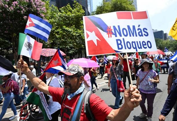 (260726) -- MEXICO CITY, July 26, 2026 -- Protesters march during a demonstration in support of Cuba and against U.S. embargo on Cuba, in Mexico City, Mexico on July 26, 2026. The demonstration aimed to commemorate the 73rd anniversary of the assault on Moncada and Carlos Manuel de Cespedes garrisons that took place on July 26, 1953, seen as the beginning of the Cuban Revolution. ) MEXICO-MEXICO CITY-SUPPORT CUBA WuxWei 