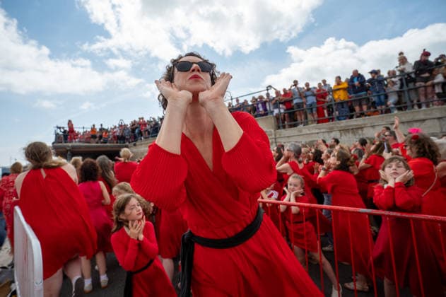 July 26, 2026, Folkstone, Kent, United Kingdom: A participant dressed as Cathy takes part in the Most Wuthering Heights Day Ever in Folkestone. Folkestone once again hosted The Most Wuthering Heights Day Ever, as hundreds of participants dressed in flowing red gathered to recreate the iconic dance from Kate Bush s 1978 hit, Wuthering Heights. Continuing a tradition that began in 2018, the event welcomed both returning dancers and newcomers, celebrating music, creativity, and community while transforming the Harbour Arm into a sea of red. Folkstone United Kingdom  - ZUMAs197 20260726_aaa_s197_145 Copyright: xJamesxWilloughbyx