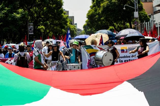 July 26, 2026, Mexico City, Mexico: MEXICO Mexico City, MEXICO Ã¢â‚¬ JULY 26, 2026: Demonstrators, including members of the Cuban community in Mexico and activists from various organisations, march from Plaza Palestina Libre to the U.S. Consulate in Mexico City to call for an end to the U.S. embargo on Cuba. During the demonstration, participants expressed support for Cuban sovereignty and criticised U.S. policy toward Cuba and broader U.S. involvement in Latin America. Mexico City Mexico  - ZUMAq101 20260726_zna_q101_219 Copyright: xAddixSetyawanx