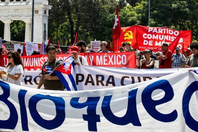 July 26, 2026, Mexico City, Mexico: MEXICO Mexico City, MEXICO Ã¢â‚¬ JULY 26, 2026: Demonstrators, including members of the Cuban community in Mexico and activists from various organisations, march from Plaza Palestina Libre to the U.S. Consulate in Mexico City to call for an end to the U.S. embargo on Cuba. During the demonstration, participants expressed support for Cuban sovereignty and criticised U.S. policy toward Cuba and broader U.S. involvement in Latin America. Mexico City Mexico  - ZUMAq101 20260726_zna_q101_221 Copyright: xAddixSetyawanx