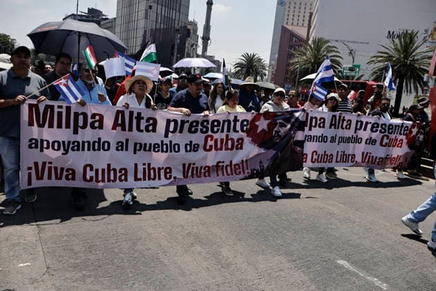 July 26, 2026, Mexico City, Cdmx, Mexico: Marking 73 years since the assault on the Moncada BarracksÃ¢â‚¬which launched the Cuban Revolution, thousands of Mexicans marched in support of Cuba and in opposition to the United States, protesting the intensified blockade of recent months and the threatened invasion by the Donald Trump administration. Participants gathered at the former U.S. embassy, shouting in support of RaoÂºl CastroÃ¢â‚¬â ¢s government and signaling solidarity during these difficult times for the Cuban people; they also emphasized that Claudia SheinbaumÃ¢â‚¬â ¢s government and civil society would continue sending oil and humanitarian aid to alleviate the impact on the island s citizens. Mexico City Mexico  - ZUMAp204 20260726_zip_p204_068 Copyright: xJosuexPerezx