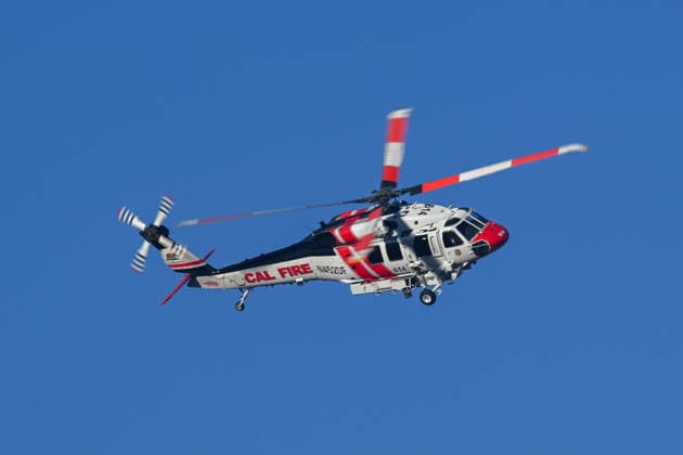 Mines Fire of wildfire continues in Santa Clara County of California SANTA CLARA COUNTY, CALIFORNIA - JULY 26: A fire helicopter is flying to drop water on burning areas as crews battle with wildfire named as Mines Fire in Santa Clara County, California on July 26, 2026. Tayfun Coskun Anadolu California United States. Editorial use only. Please get in touch for any other usage.  Copyright: x2026xAnadoluxTayfunxCoskunx