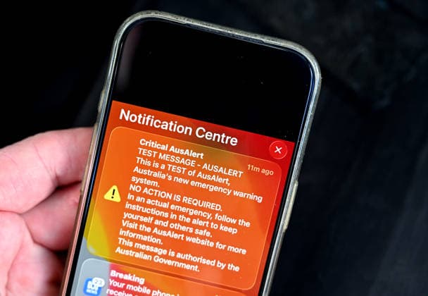 NATIONAL AUSALERT TEST, The text message from the National AusAlert system is displayed on an iPhone in Brisbane, Monday, July 27, 2026. ( NO ARCHIVING BRISBANE QUEENSLAND AUSTRALIA  Copyright: xDARRENxENGLANDx 20260727159196209538