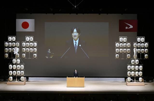 Japan crown prince at high school cultural festival Japan s Crown Prince Fumihito addresses the opening ceremony of a national high school cultural festival in Akita, northeastern Japan, on July 26, 2026.  A14AA0005624116P