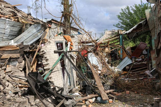 The premises of a house show damage caused by a direct hit from a Russian S8000 Banderol cruise missile on a residential area in the Slobidskyi district, Kharkiv, Ukraine, July 26, 2026. A 40-year-old woman was killed in the attack, and 12 people were injured. In total, at least 22 private houses and power lines were damaged in the district. (Photo by Viacheslav Madiievskyi Ukrinform) Russians strike residential area in Kharkiv with Banderol missile  Copyright: xViacheslavxMadiievskyix