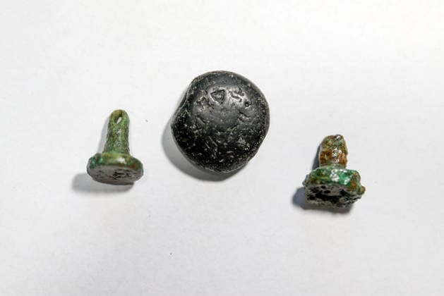 Gold amulet, ancient seal unearthed at Turkmen Karahoyuk excavation in Turkiye s Konya KONYA, TURKIYE - JULY 26: A 3,500-year-old lead seal inscribed with Luwian hieroglyphs and bronze seal stamps unearthed during excavations at the Turkmen Karahoyuk archaeological site are displayed in the Cumra district of Konya, Turkiye, on July 26, 2026. Archaeologists also discovered a gold amulet dating to the Roman period during the ongoing excavations at the ancient settlement. Serhat Cetinkaya Anadolu Konya Turkey. Editorial use only. Please get in touch for any other usage.  Copyright: x2026xAnadoluxSerhatxCetinkayax