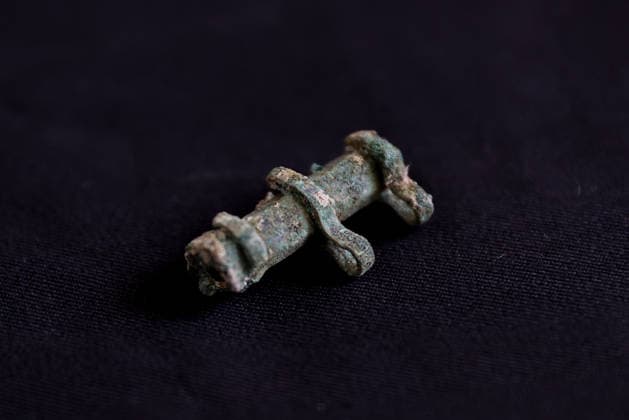 Gold amulet, ancient seal unearthed at Turkmen Karahoyuk excavation in Turkiye s Konya KONYA, TURKIYE - JULY 26: A bronze artifact unearthed during archaeological excavations at the Turkmen Karahoyuk archaeological site in the Cumra district of Konya, Turkiye, is displayed on July 26, 2026. During the ongoing excavations, archaeologists also discovered a 3,500-year-old seal inscribed with Luwian hieroglyphs and a gold amulet dating to the Roman period. Serhat Cetinkaya Anadolu Konya Turkey. Editorial use only. Please get in touch for any other usage.  Copyright: x2026xAnadoluxSerhatxCetinkayax