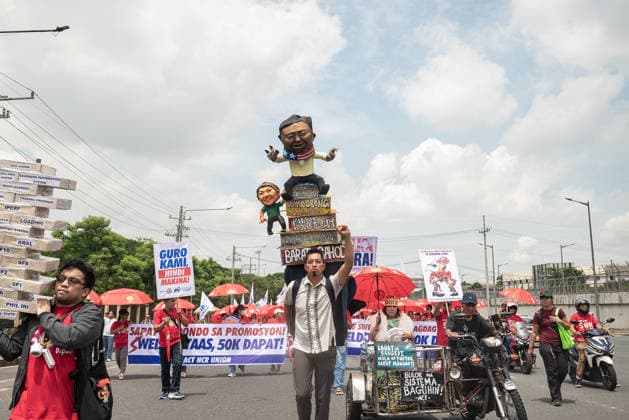 July 27, 2026, Quezon City, Quezon, Philippines: On June 27, 2026, as President Ferdinand Marcos, Jr. delivers his 5th State of the Nation Address (SONA), a multisectoral protest was held along Commonwealth Avenue to oppose the presidentÃ¢â‚¬â ¢s upcoming speech. The protest was joined by thousands of people from various sectors and were barred from nearing the venue of the event. During the protest, over 40 individuals were arrested by police officers. Quezon City Philippines  - ZUMAy102 20260727_zip_y102_005 Copyright: xKenosisxYapx