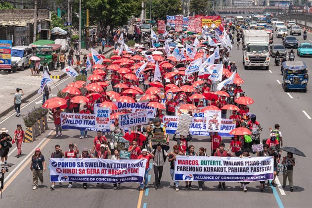 July 27, 2026, Quezon City, Quezon, Philippines: On June 27, 2026, as President Ferdinand Marcos, Jr. delivers his 5th State of the Nation Address (SONA), a multisectoral protest was held along Commonwealth Avenue to oppose the presidentÃ¢â‚¬â ¢s upcoming speech. The protest was joined by thousands of people from various sectors and were barred from nearing the venue of the event. During the protest, over 40 individuals were arrested by police officers. Quezon City Philippines  - ZUMAy102 20260727_zip_y102_006 Copyright: xKenosisxYapx