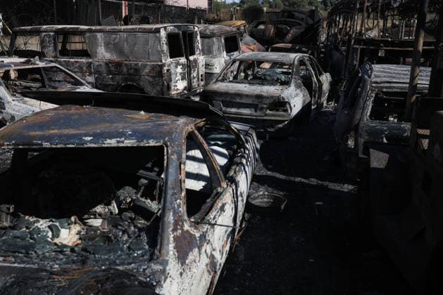 The wildfire in Madrid’s Sierra Oeste slowed its spread overnight, though it has not yet been brought under control. Several cars were burned, as of July 27, 2026, in Chapinería, Madrid, Spain. The wildfires affecting the Community of Madrid have slowed their spread overnight, a development that has allowed firefighting crews to tackle the various hotspots; however, the fire remains active and uncontrolled, and there is concern that wind gusts of up to 30 kilometers per hour forecast for today will complicate firefighting efforts on July 27, 2026. Alejandro Martínez Vé, Madrid, Madrid, Spain  Copyright: xAlejandroxMartinezxVÃ lezx 7689262