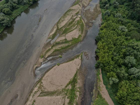 Poland s San River with low water levels as drought intensifies STALOWA WOLA, POLAND- JULY 27: An aerial view of San River with low water levels due to the ongoing drought in Poland in Stalowa Wola, Poland on July 27, 2026. Currently, low water levels have been recorded at 66 percent of Poland’s hydrological stations. Warnings over worsening dry conditions were issued earlier in July, when Poland’s national weather agency said hydrological drought had spread across much of the country. Officials reported falling river levels, reduced groundwater supplies and more monitoring stations recording flows below long-term minimum thresholds. At the end of this week, a heatwave is predicted with temperatures to raise above 35 Celsius degrees. Omar  Copyright: x2026xAnadoluxOmarxMarquesx