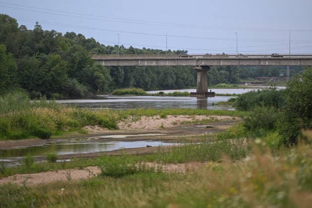 Poland s San River with low water levels as drought intensifies STALOWA WOLA, POLAND- JULY 27: A view of San River with low water levels due to the ongoing drought in Poland in Stalowa Wola, Poland on July 27, 2026. Currently, low water levels have been recorded at 66 percent of Poland’s hydrological stations. Warnings over worsening dry conditions were issued earlier in July, when Poland’s national weather agency said hydrological drought had spread across much of the country. Officials reported falling river levels, reduced groundwater supplies and more monitoring stations recording flows below long-term minimum thresholds. At the end of this week, a heatwave is predicted with temperatures to raise above 35 Celsius degrees. Omar Marques  Copyright: x2026xAnadoluxOmarxMarquesx