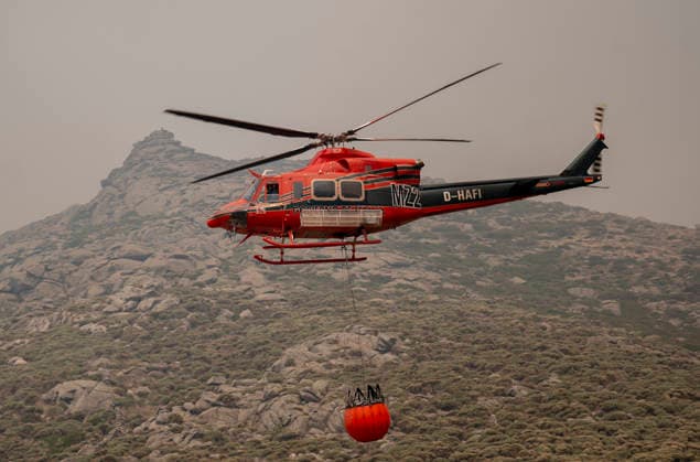 The fire in Ávila is now the largest in Spain’s history, having burned 55,000 hectares. A helicopter is assisting with firefighting efforts on July 27, 2026, in Mijares, Ávila, Castile and León, Spain. The Burgohondo forest fire in Ávila has burned 55,000 hectares, making it the largest fire on record in Spain. Currently, firefighting efforts are focused on two active zones of concern to firefighters: the Mijares Pass and the area surrounding the town of Casillas. July 27, 2026 Ávila, Castile and León, Spain  Copyright: xAlbertoxOrtegax 7689408