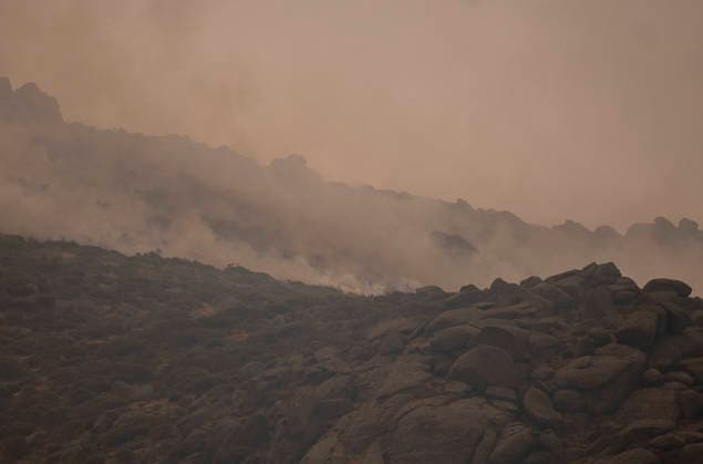 The fire in Ávila is now the largest in Spain’s history, having burned 55,000 hectares. View of the smoke from the wildfire on July 27, 2026, in Mijares, Ávila, Castile and León, Spain. The forest fire in Burgohondo, Ávila, has burned 55,000 hectares, making it the largest fire on record in Spain. Currently, firefighting efforts are focused on two active zones of concern to crews: the Mijares Pass and the area surrounding the municipality of Casillas. JULY 27, 2026 Ávila, Castile and León Ávila, Castile and León, Spain  Copyright: xAlbertoxOrtegax 7689425