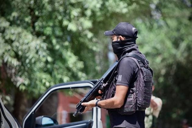 Security Tightened in Kulgam After Anantnag Attack KULGAM, JAMMU AND KASHMIR, INDIA JULY 27, 2026: Police and security personnel inspect vehicles, frisk passengers and verify identities at checkpoints in Kulgam following the July 22 terrorist attack in Anantnag, in which police officer Ashiq Hussain was killed. Security measures have been intensified across South Kashmir as part of a wider counterterrorism operation. SRINAGAR India Copyright: x xHilalxZargarx xJNAxPressx