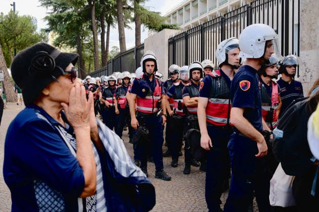 July 27, 2026, U.S.: A protester stands beside and yells at Tirana s police force during a demonstration outside of Skanderberg Square on the 57th morning of Albania s Flamingo Revolution against EDI RAMA and his government. U.S.  - ZUMAm354 20260727_znp_m354_007 Copyright: xMadiganxMurphyx