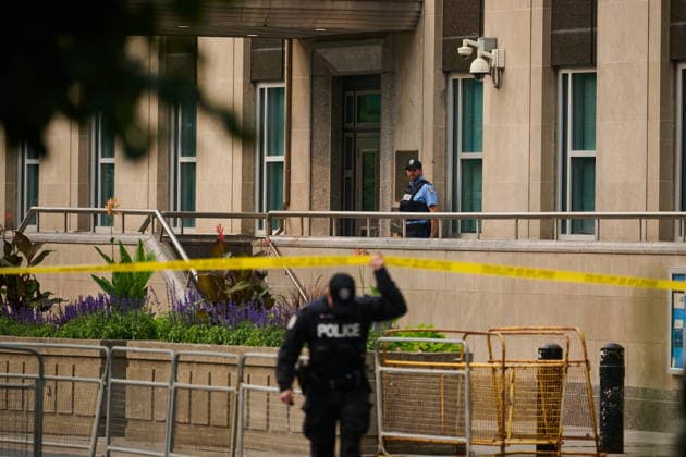 July 27, 2026, Toronto, On, Canada: Police work the scene of an early morning shooting outside the U.S. Consulate in Toronto on Monday, July 27, 2026. Toronto Canada  - ZUMAc35_ 20260727_zaf_c35_003 Copyright: xSammyxKoganx
