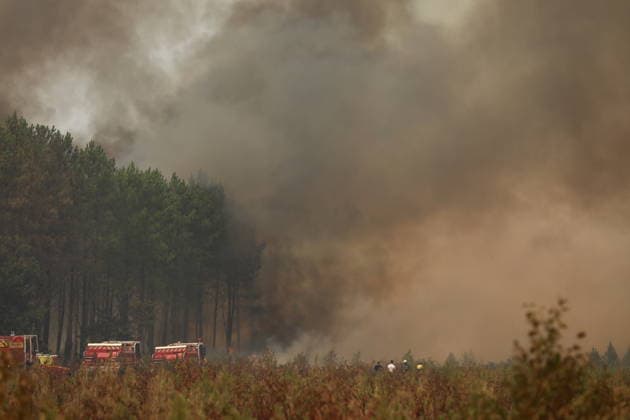 Massive wildfire burns 42,000 hectares in Gironde, southwestern France GIRONDE, FRANCE - JULY 27: A massive wildfire struck the Gironde department of southwestern France on July 27, 2026. As firefighters continued efforts to contain the flames, the wildfire caused widespread destruction across affected areas, where burned vehicles, damaged buildings, destroyed roads, and charred trees were visible. The blaze, which started in the Saumos area on Wednesday, has burned around 42,000 hectares, according to Gironde authorities. More than 220,000 people were evacuated as a precaution, while around 240 homes were fully or partially damaged. Around 2,500 firefighters, 1,500 soldiers and 1,200 security personnel are involved in the response as crews  Copyright: x2026xAnadoluxMohamadxSalaheldinxAbdelghanixAlsayedx