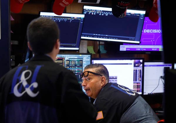 Traders work on the floor of the New York Stock Exchange on Wall Street on Monday, July 27, 2026 in New York City. The DOW began the day up over 600 points before falling back a bit but chip stocks. There was a pause in Iran fighting over the weekend.  NYP20260727108 JOHNxANGELILLO
