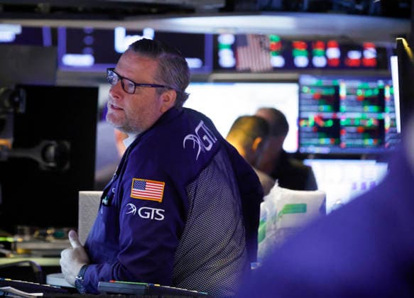 Traders work on the floor of the New York Stock Exchange on Wall Street on Monday, July 27, 2026 in New York City. The DOW began the day up over 600 points before falling back a bit but chip stocks. There was a pause in Iran fighting over the weekend.  NYP20260727109 JOHNxANGELILLO