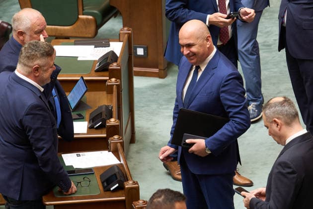 Extraordinary Session of the Romanian Senate, Bucharest, Romania Bucharest, Romania. 27th Jul, 2026: Senator Ilie Gavril Bolojan, dismissed Prime Minister of Romania, attends the plenary sitting of the extraordinary session of the Romanian Senate. Bucharest Romania Copyright: xLucianxAlecux