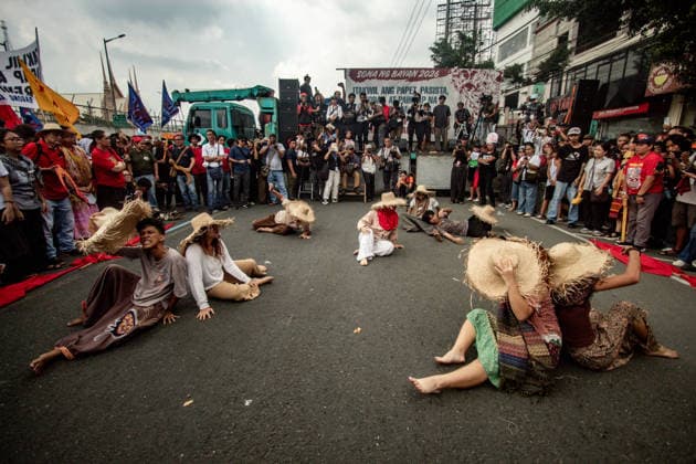 July 27, 2026, Quezon, Metro Manila, Philippines: Numbering in the thousands, multi-sectoral groups marched along Commonwealth Avenue for the Ã¢â‚¬ËœPeopleÃ¢â‚¬â ¢s SONAÃ¢â‚¬â ¢, coinciding with the 5th State of the Nation Address of Pres. Ferdinand Marcos Jr., July 27. Protesters called for greater accountability amidst government impunity, and the rejection of imperialist control of the United States over the Philippines in face of projects such as the Pax Silica Initiative which threatens to intensify issues of displacement and large-scale mining in the country. Quezon Philippines - ZUMAs383 20260727_zip_s383_003 Copyright: xNathanielxSorianox
