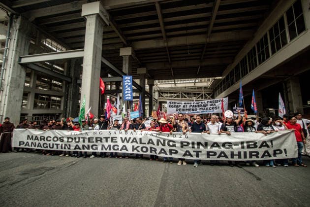 July 27, 2026, Quezon, Metro Manila, Philippines: Numbering in the thousands, multi-sectoral groups marched along Commonwealth Avenue for the Ã¢â‚¬ËœPeopleÃ¢â‚¬â ¢s SONAÃ¢â‚¬â ¢, coinciding with the 5th State of the Nation Address of Pres. Ferdinand Marcos Jr., July 27. Protesters called for greater accountability amidst government impunity, and the rejection of imperialist control of the United States over the Philippines in face of projects such as the Pax Silica Initiative which threatens to intensify issues of displacement and large-scale mining in the country. Quezon Philippines - ZUMAs383 20260727_zip_s383_007 Copyright: xNathanielxSorianox