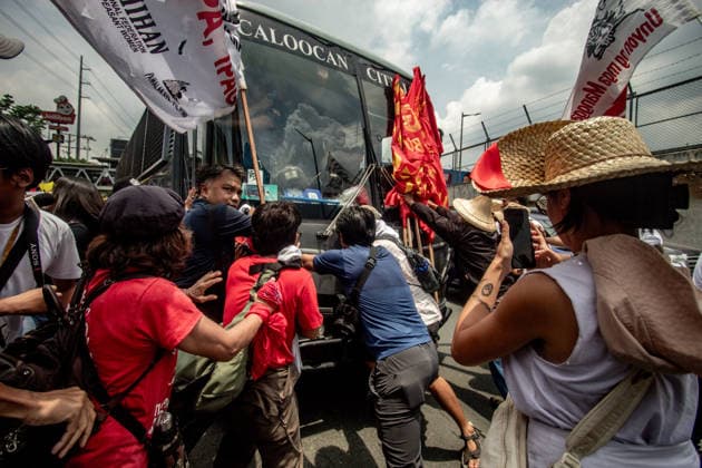 July 27, 2026, Quezon, Metro Manila, Philippines: Numbering in the thousands, multi-sectoral groups marched along Commonwealth Avenue for the Ã¢â‚¬ËœPeopleÃ¢â‚¬â ¢s SONAÃ¢â‚¬â ¢, coinciding with the 5th State of the Nation Address of Pres. Ferdinand Marcos Jr., July 27. Protesters called for greater accountability amidst government impunity, and the rejection of imperialist control of the United States over the Philippines in face of projects such as the Pax Silica Initiative which threatens to intensify issues of displacement and large-scale mining in the country. Quezon Philippines  - ZUMAs383 20260727_zip_s383_014 Copyright: xNathanielxSorianox