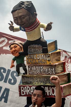 July 27, 2026, Quezon, Metro Manila, Philippines: Numbering in the thousands, multi-sectoral groups marched along Commonwealth Avenue for the Ã¢â‚¬ËœPeopleÃ¢â‚¬â ¢s SONAÃ¢â‚¬â ¢, coinciding with the 5th State of the Nation Address of Pres. Ferdinand Marcos Jr., July 27. Protesters called for greater accountability amidst government impunity, and the rejection of imperialist control of the United States over the Philippines in face of projects such as the Pax Silica Initiative which threatens to intensify issues of displacement and large-scale mining in the country. Quezon Philippines  - ZUMAs383 20260727_zip_s383_009 Copyright: xNathanielxSorianox