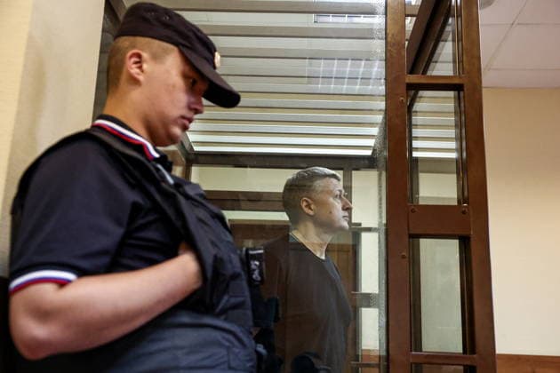 RUSSIA, MOSCOW - JULY 27, 2026: Businessman Sergei Borodin (back) appears for a hearing at Simonovsky District Court on bribery charges. Borodin is a subject of a criminal investigation against Russia s former defence minister Timur Ivanov. The court found Borodin guilty and sentenced him to 8 years in prison. Mikhail Tereshchenko TASS  95531824