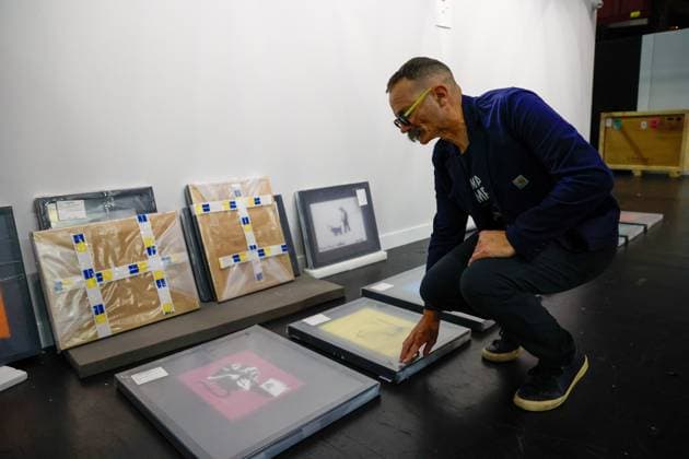 July 27, 2026, Tampa, Florida, USA: Richard Wormley, an assistant curator, speaks about art pieces by street artist, Banksy, at the Straz Center on Monday, July 27, 2026, in Tampa. Tampa USA  - ZUMAs70_ 20260727_zan_s70_014 Copyright: xJeffereexWoox