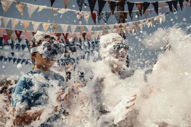 July 27, 2026, Fornells, Menorca Balearic Islands, Spain: Children get covered in foam as they participate in a foam party looking for some refreshment during the traditional Sant AntoniFestival in Fornells Fornells Spain - ZUMAo105 20260727_fap_o105_004 Copyright: xMatthiasxOesterlex