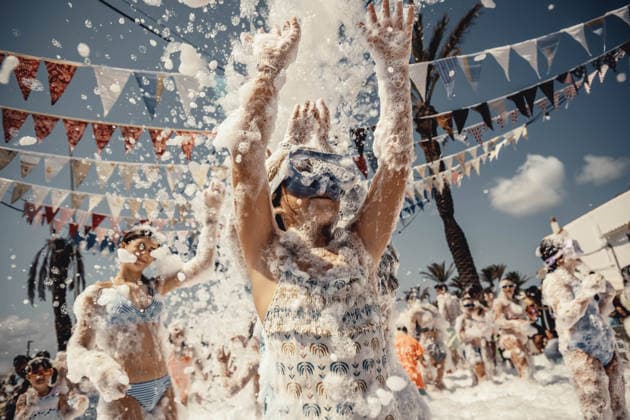 July 27, 2026, Fornells, Menorca Balearic Islands, Spain: Children get covered in foam as they participate in a foam party looking for some refreshment during the traditional Sant AntoniFestival in Fornells Fornells Spain  - ZUMAo105 20260727_fap_o105_005 Copyright: xMatthiasxOesterlex
