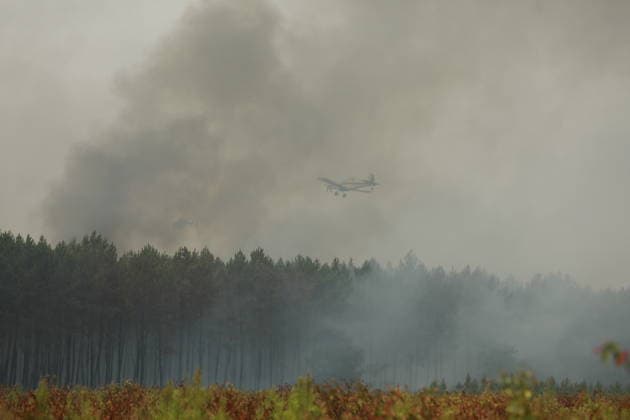 Massive wildfire burns 42,000 hectares in Gironde, southwestern France GIRONDE, FRANCE - JULY 27: A massive wildfire struck the Gironde department of southwestern France on July 27, 2026. As firefighters continued efforts to contain the flames, the wildfire caused widespread destruction across affected areas, where burned vehicles, damaged buildings, destroyed roads, and charred trees were visible. The blaze, which started in the Saumos area on Wednesday, has burned around 42,000 hectares, according to Gironde authorities. More than 220,000 people were evacuated as a precaution, while around 240 homes were fully or partially damaged. Around 2,500 firefighters, 1,500 soldiers and 1,200 security personnel are involved in the response as crews  Copyright: x2026xAnadoluxMohamadxSalaheldinxAbdelghanixAlsayedx