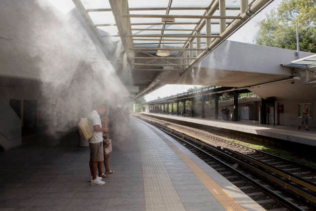 Athens Greece Heatwave People wait near water spray on the platform at Thiseio station in Athens, Attica, Greece on July 27, 2026. The water spray system operates as high summer temperatures persist in the Greek capital. Athens Attica Greece Copyright: xElvisxTakahashixMantellox