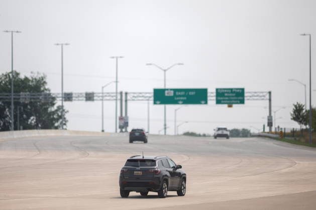 July 27, 2026, Windsor, On, CANADA: Vehicles approach the expressways after exiting the toll booths at the Gordie Howe International Bridge in Windsor, Ont., on the first day open to vehicles, Monday, July 27, 2026. Windsor CANADA  - ZUMAc35_ 20260727_zaf_c35_092 Copyright: xDaxxMelmerx