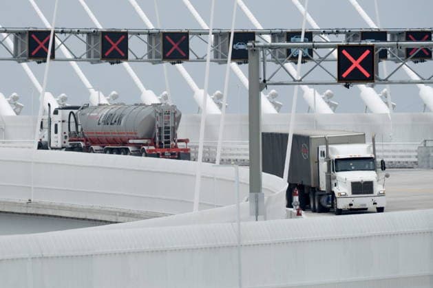 July 27, 2026, Windsor, On, CANADA: Transports trucks use the Gordie Howe International Bridge in Windsor, Ont., on the first day open to vehicles, Monday, July 27, 2026. Windsor CANADA  - ZUMAc35_ 20260727_zaf_c35_096 Copyright: xDaxxMelmerx