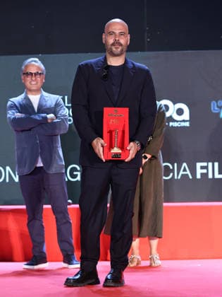 IPA87054140 - Soverato (CZ), 23rd edition of the Magna Graecia Film Festival - Third night. Pictured: Marco D Amore receives the Colonna d Oro Award  Copyright: xMarcoxProvvisionatox xMarcoxProvvisionatox 87054140