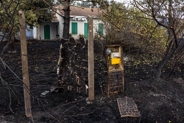 Burned Properties After The Gironde Wildfires - Lege Burned residential properties are seen after the passage of the wildfire, smoke continues to rise from the affected areas as firefighters monitor remaining hotspots in Lège, France, on July 27, 2026. Photo by Margot Le Gonidec ABACAPRESS.COM Lège France  Copyright: xLexGonidecxMargot ABACAx