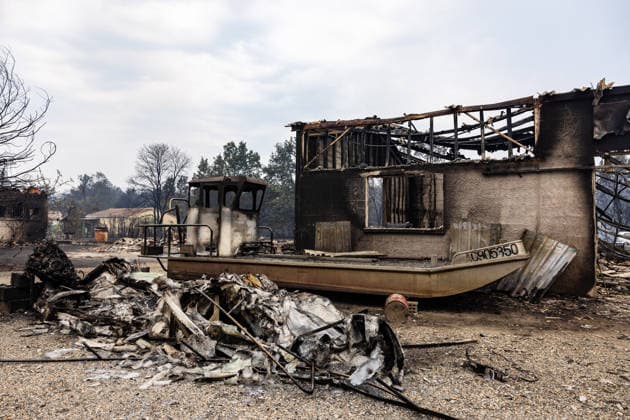 Burned Properties After The Gironde Wildfires - Lege Burned residential properties are seen after the passage of the wildfire, smoke continues to rise from the affected areas as firefighters monitor remaining hotspots in Lège, France, on July 27, 2026. Photo by Margot Le Gonidec ABACAPRESS.COM Lège France  Copyright: xLexGonidecxMargot ABACAx
