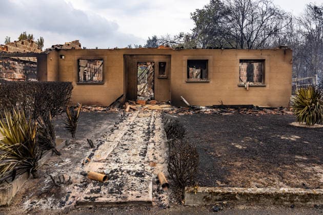 Burned Properties After The Gironde Wildfires - Lege Burned residential properties are seen after the passage of the wildfire, smoke continues to rise from the affected areas as firefighters monitor remaining hotspots in Lège, France, on July 27, 2026. Photo by Margot Le Gonidec ABACAPRESS.COM Lège France  Copyright: xLexGonidecxMargot ABACAx