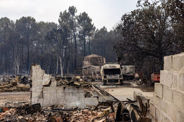 Burned Properties After The Gironde Wildfires - Lege Burned residential properties are seen after the passage of the wildfire, smoke continues to rise from the affected areas as firefighters monitor remaining hotspots in Lège, France, on July 27, 2026. Photo by Margot Le Gonidec ABACAPRESS.COM Lège France  Copyright: xLexGonidecxMargot ABACAx