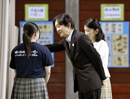 Japan crown prince at high school cultural festival Japan s Crown Prince Fumihito and Crown Princess Kiko chat with a student while looking at calligraphy works during a national high school cultural festival in the northeastern Japan city of Akita on July 27, 2026.  A14AA0005624303P