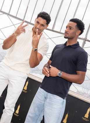 July 27, 2026, New York, New York, USA: MICHAEL EVANS BEHLING and NATHANIEL LOGAN MCINTYRE visit the Empire State Building in New York to celebrate the eighth and final season of All American on the CW. 28 July 2026 New York USA  - ZUMAa265 20260727_zep_a265_059 Copyright: xEricxAcquayex