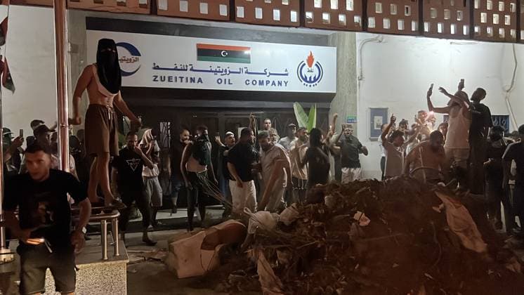 Protesters block entrances of NOC-affiliated companies over power outages in Tripoli TRIPOLI, LIBYA - JULY 28: Protesters place piles of rubble at the entrances of the company buildings as demonstrations over the prolonged power cuts continue outside the buildings of companies affiliated with Libya s National Oil Corporation (NOC) in the Zahra district of Tripoli, Libya, on July 28, 2026, to protest daily electricity outages across the country. Hamza Al Ahmar Anadolu Tripoli Libya. Editorial use only. Please get in touch for any other usage.  Copyright: x2026xAnadoluxHamzaxAlxAhmarx