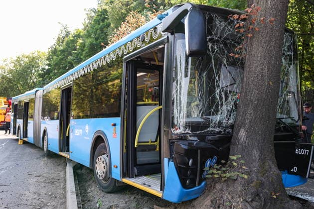 RUSSIA, MOSCOW - JULY 28, 2026: An electric bus crashes against a tree on Academician Millionshchikov Street, southern Moscow, 17 passengers injured, including two children. Alexander Shcherbak TASS  95556407